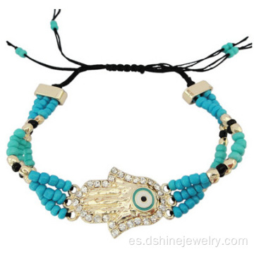 Pulsera hecha a mano del grano ajustable con Hamsa ojo suerte encanto